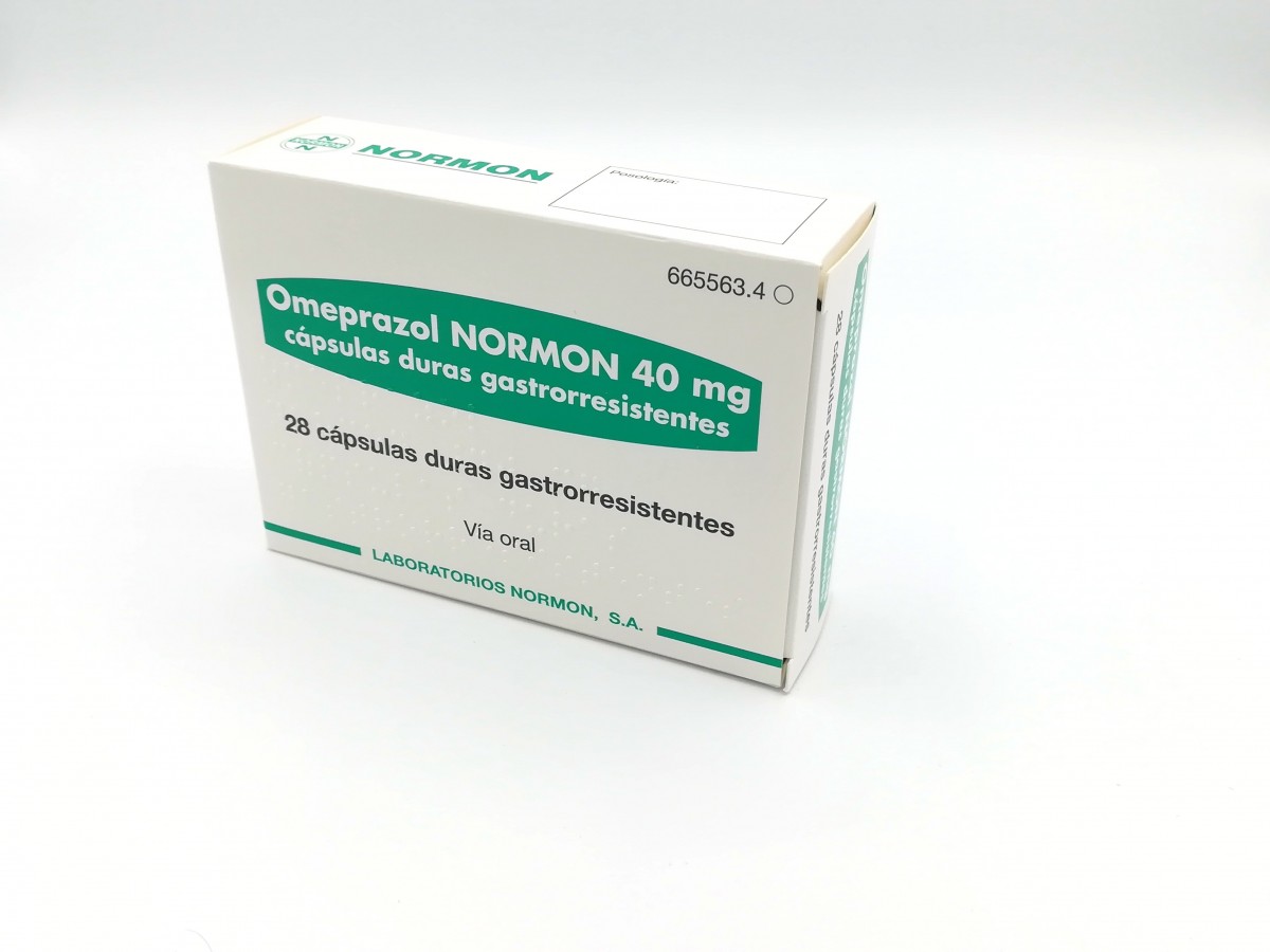 OMEPRAZOL NORMON 40 mg CAPSULAS DURAS GASTRORRESISTENTES , 28 cápsulas fotografía del envase.