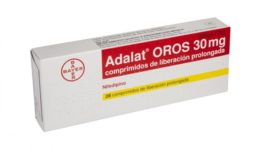 ADALAT OROS 30 mg, COMPRIMIDOS DE LIBERACION PROLONGADA, 28 comprimidos (Polipropileno - Aluminio) fotografía del envase.