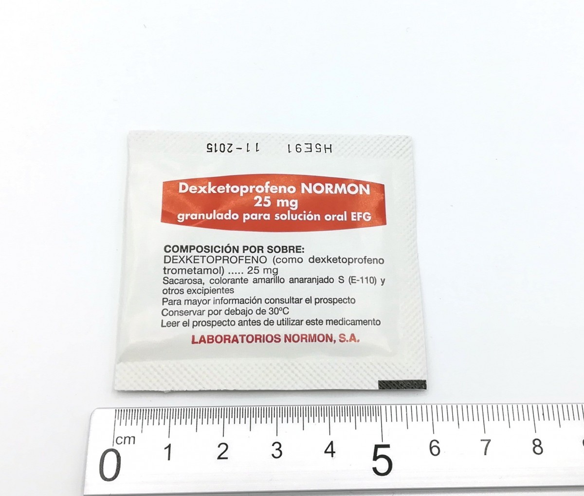 DEXKETOPROFENO NORMON 25 MG GRANULADO PARA SOLUCION ORAL EFG , 20 sobres fotografía de la forma farmacéutica.