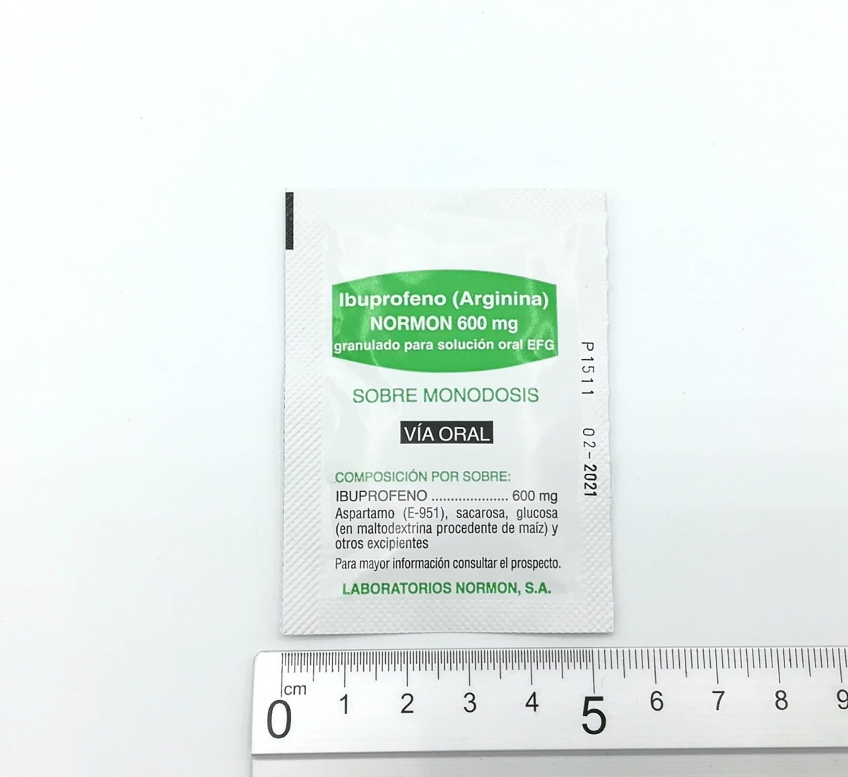 IBUPROFENO (ARGININA) NORMON 600 mg GRANULADO PARA SOLUCION ORAL EFG , 40 sobres fotografía de la forma farmacéutica.