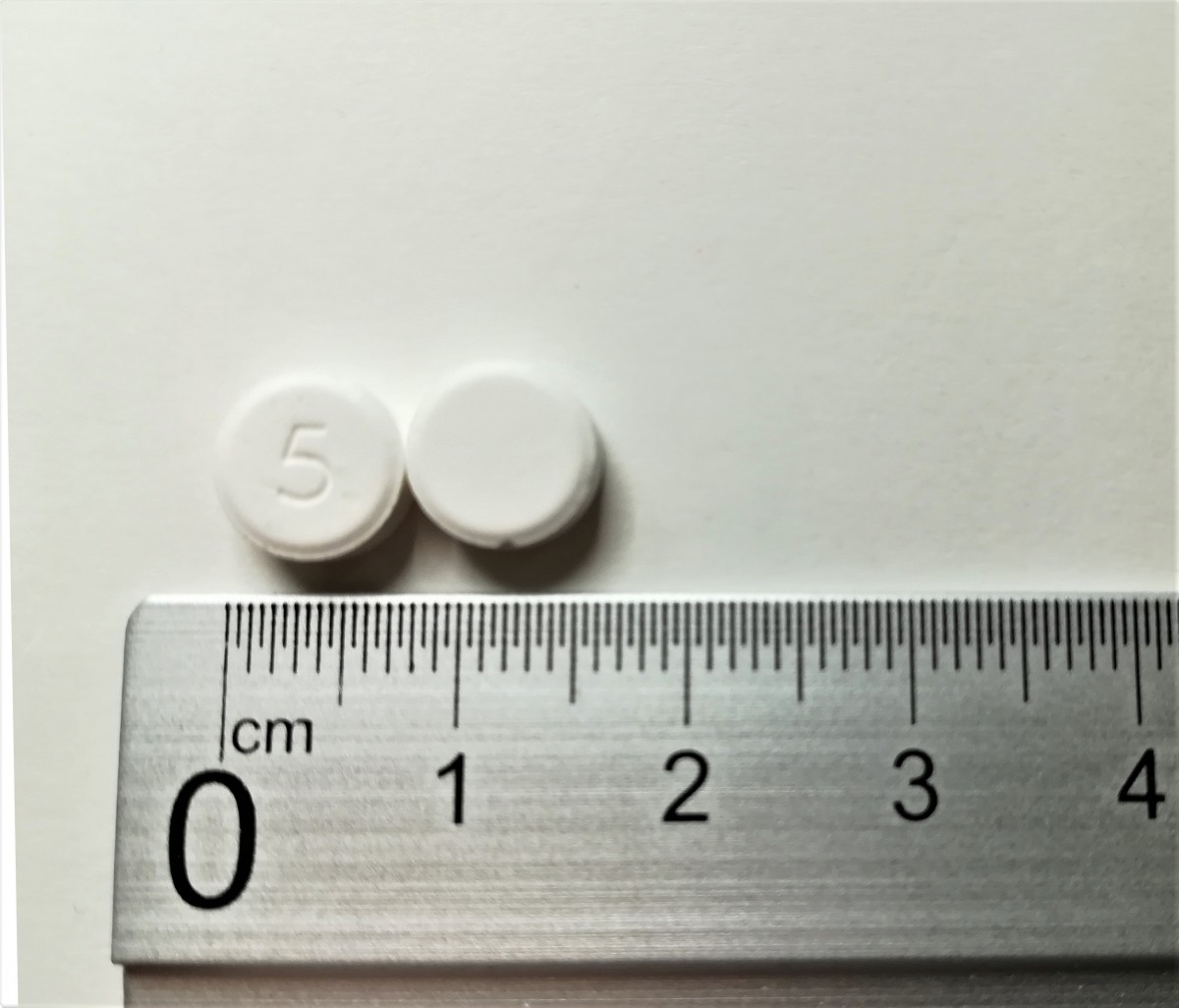ZOLMITRIPTAN NORMON 5 mg COMPRIMIDOS BUCODISPERSABLES EFG 6 comprimidos fotografía de la forma farmacéutica.